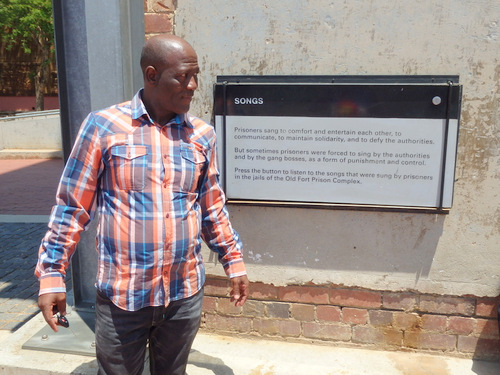 Our Guide explains and sings some Apartheid Prison Songs.